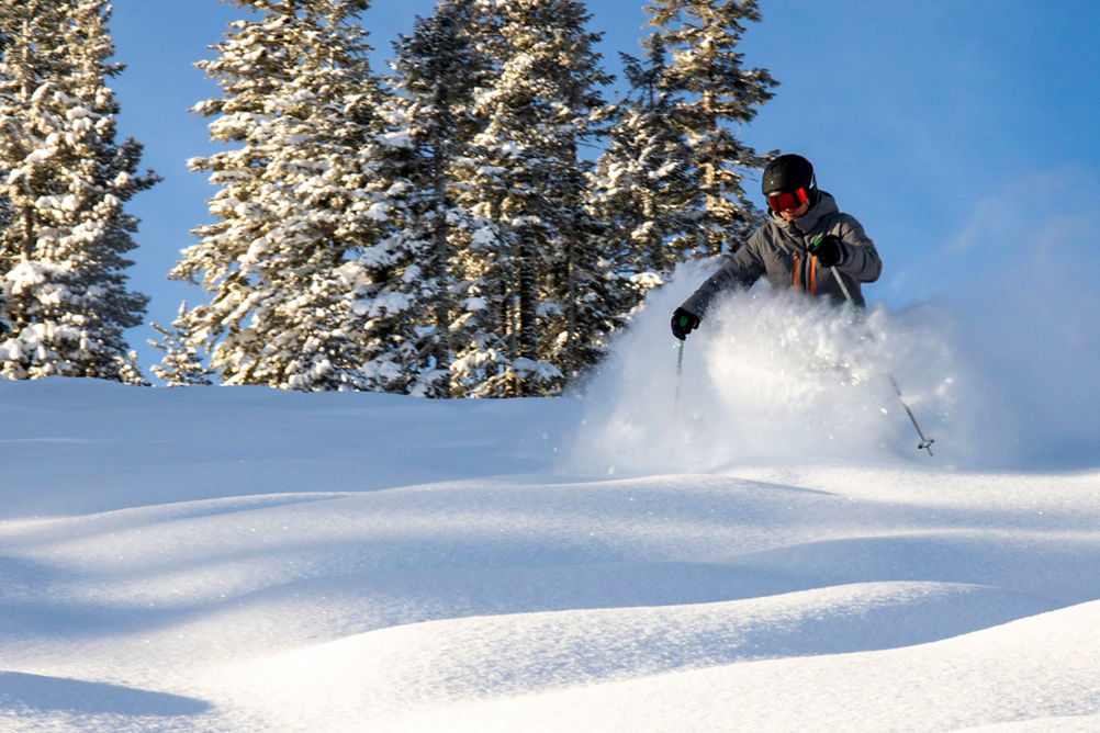 Skier Enjoys First Tracks on a Powder Day at Northstar California