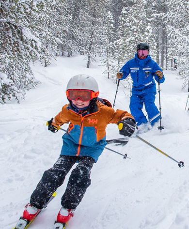 Kids ski lesson in woods at Crested Butte