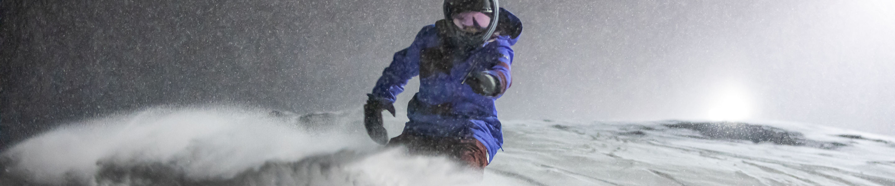 Snowboarder shreds at night on Crotched Mountain