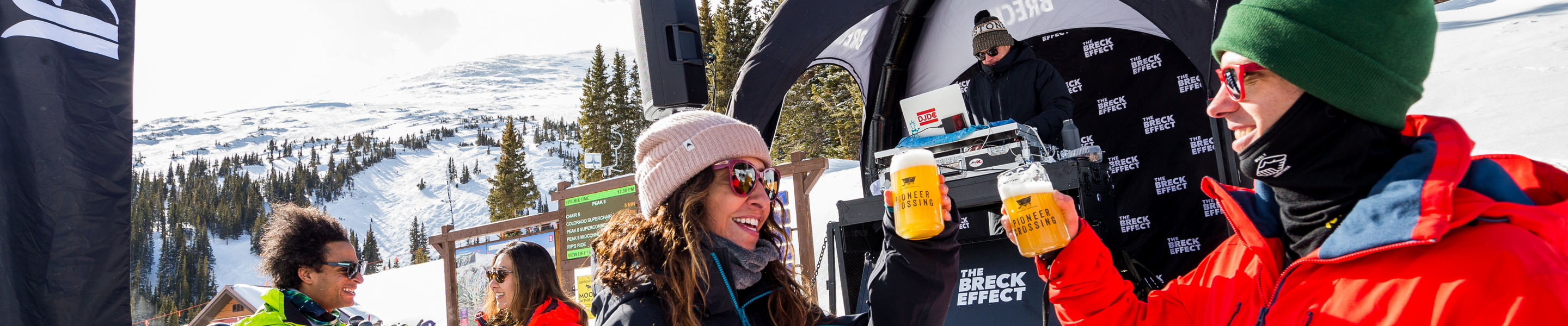 Apres ski with friends at the DJ Cat booth at Breck 