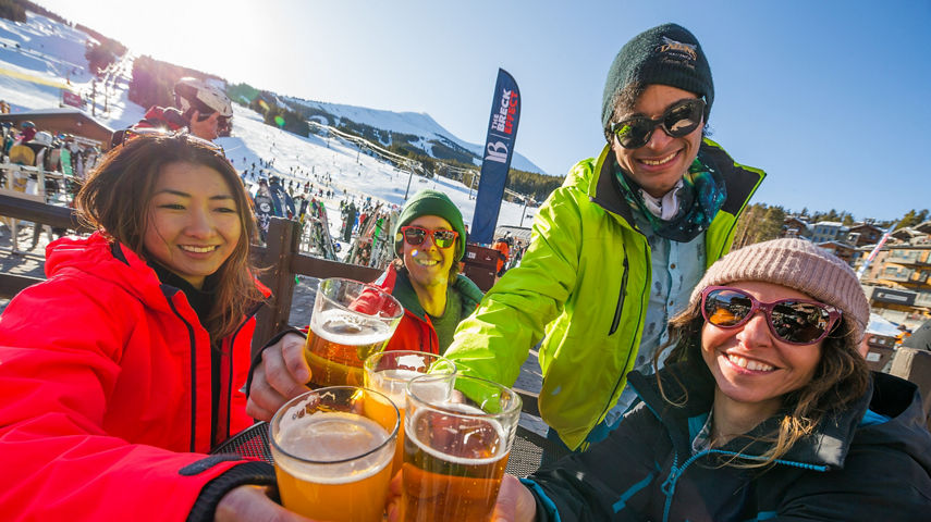 Friends enjoy a few beers at T-Bar at Breck