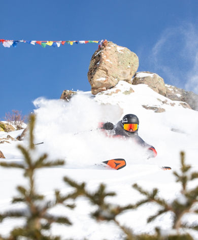 Skiing Under Prayer Flags at Crested Butte