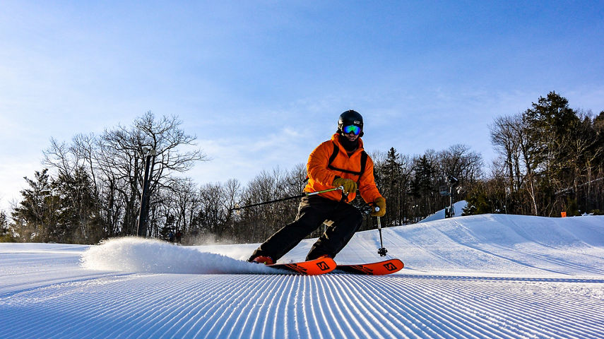 Skier Makes Turns Down Groomed Ski Run Crotched Mountain