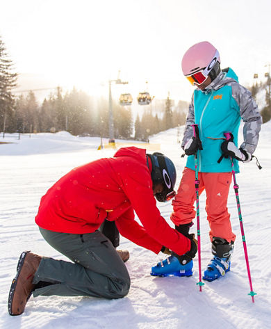 Family Getting Ready to Ski on Vail Mountain 