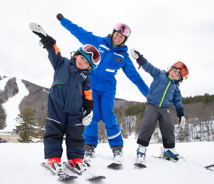 Kids Learning How to Ski with Instructor at Mount Sunapee