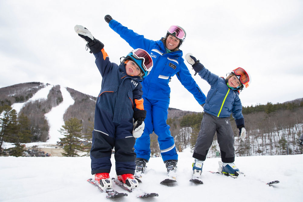 Kids Learning How to Ski with Instructor at Mount Sunapee