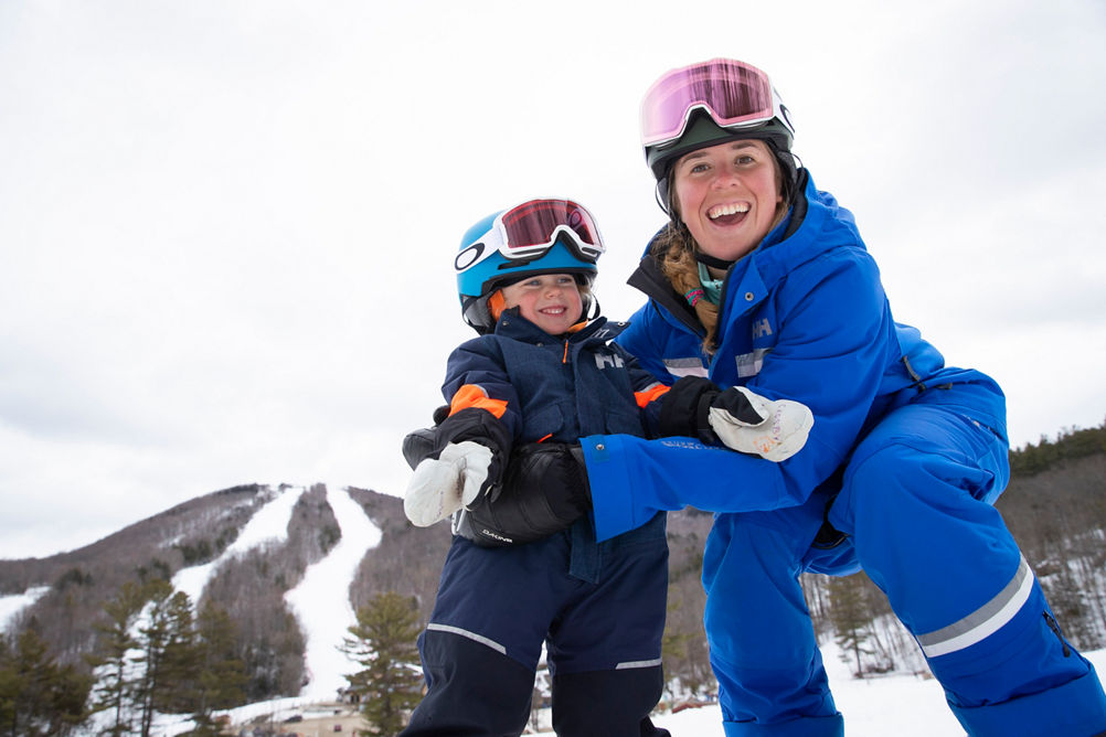 Kids Learning How to Ski with Instructor at Mount Sunapee