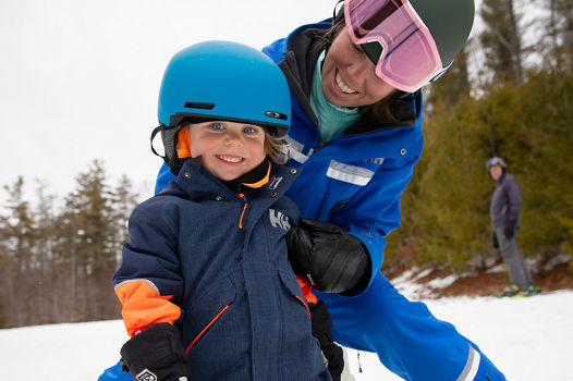 Kids Learning How to Ski with Instructor at Mount Sunapee