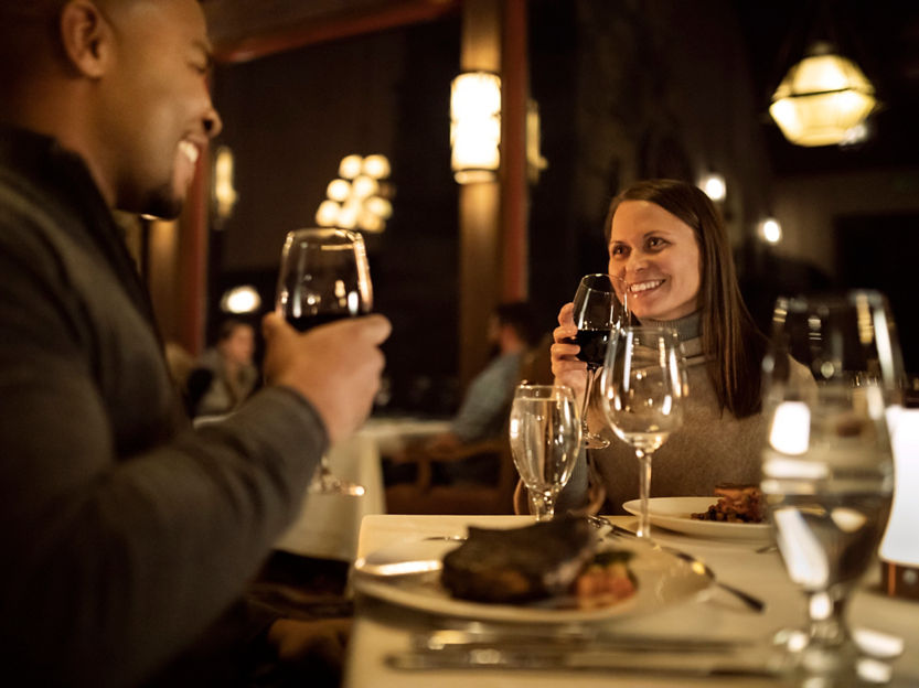 Couple Enjoys an Intimate Dinner at Allie's Cabin in Beaver Creek, CO