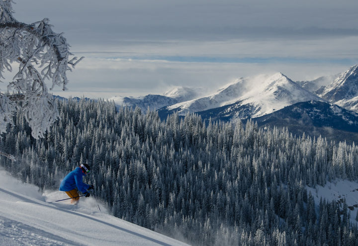 A man skiing a Powder Day at Vail, CO