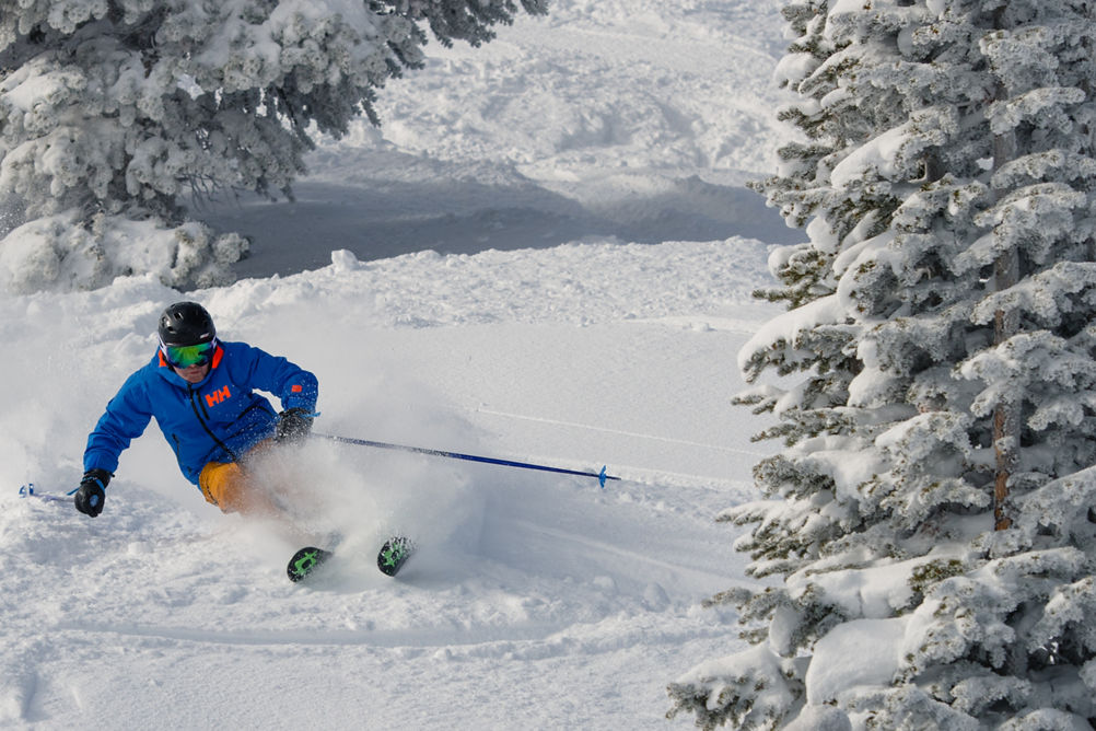 Downhill skier during a Powder Day at Vail, CO