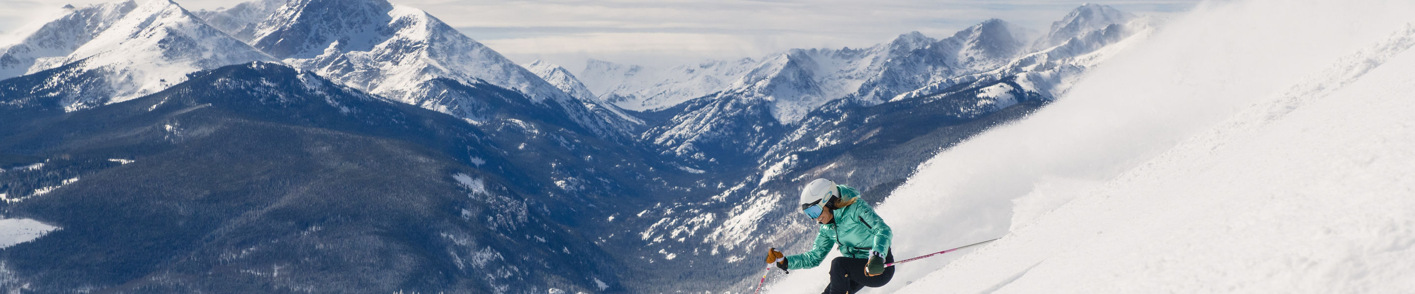 Skier skiing down Vail Mountain