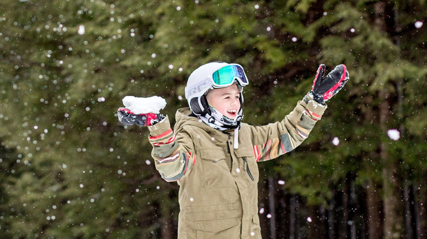 Little Boy Plays with Snow at Hunter Mountain