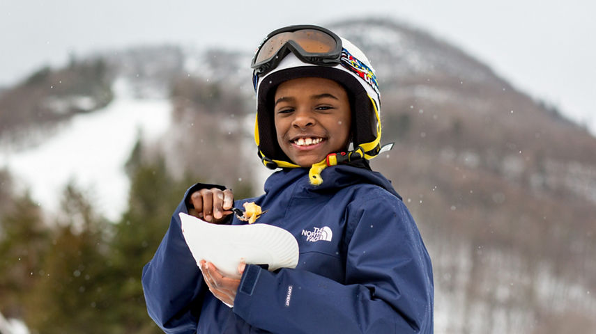 Little Boy Eats a Waffle at the Base Area of Hunter Mountain