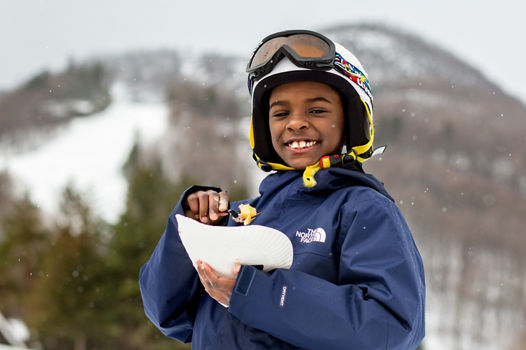 Little Boy Eats a Waffle at the Base Area of Hunter Mountain