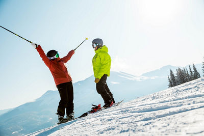 Friends celebrate powder while strapping in at Breckenridge