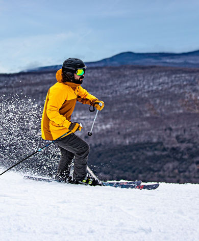 Skier Kicks Up Snow at Hunter Mountain