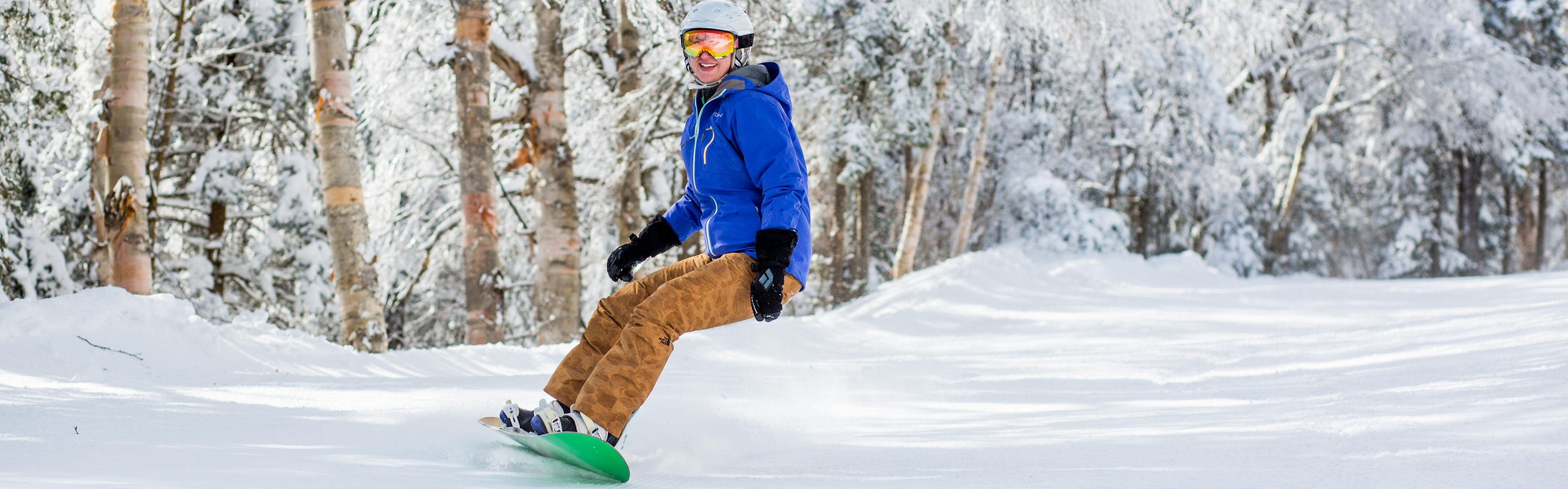 Snowboarder Makes Turns in Fresh Snow at Mount Snow