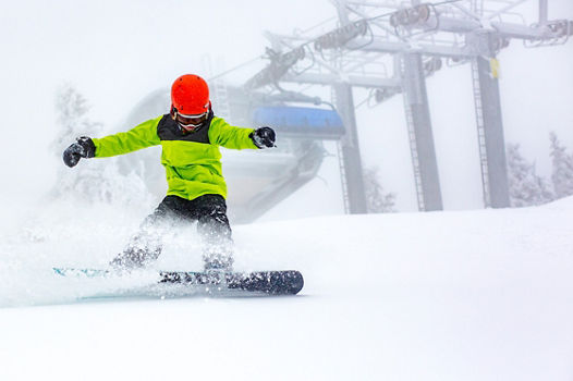 Snowboarder Makes Turns in Fresh Snow at Mount Snow