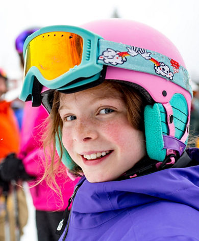 Girl Smiles in Line for Bluebird Express