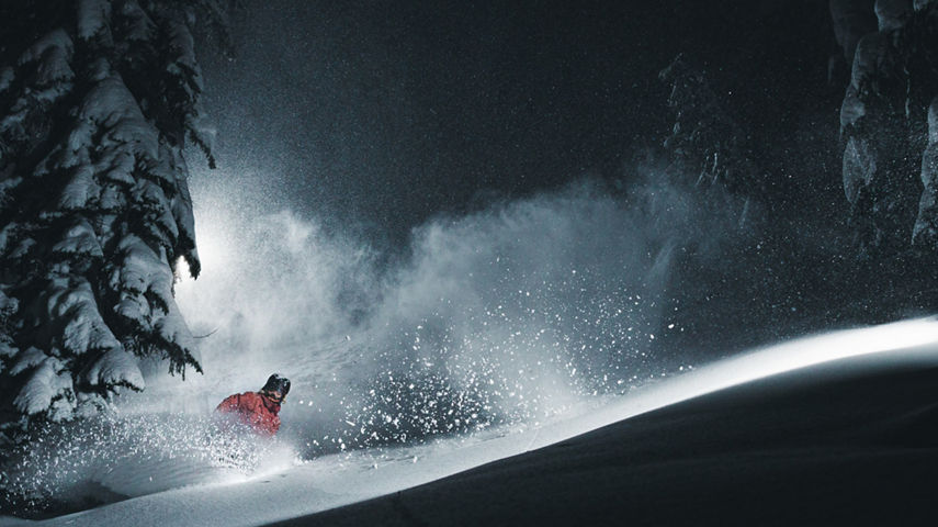 Kim Ewing Powder Turn at Night at Stevens Pass