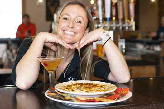 Chips and Dip with Beverage next to Bartender 