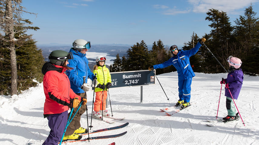 Family with Instructor at Summit  at Mount Sunapee
