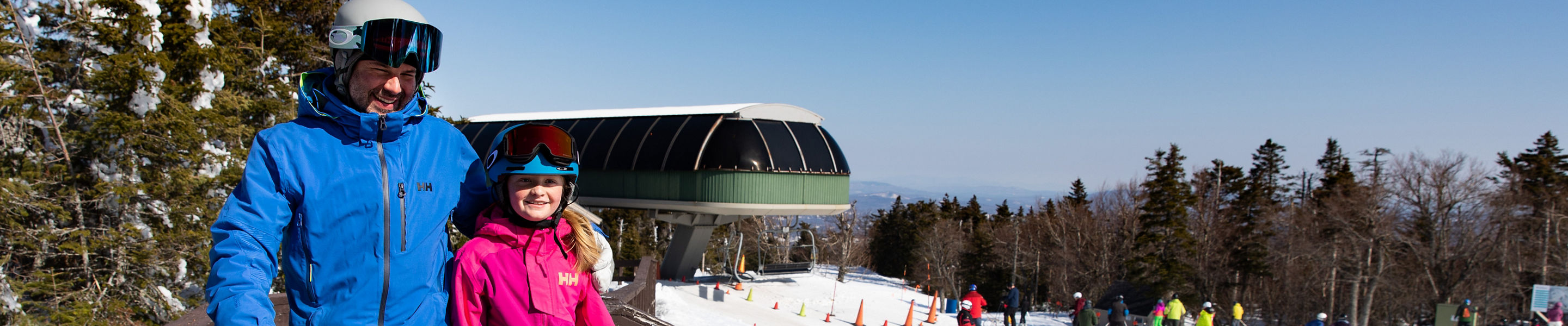 Father and Child Walking up Ramp at Summit  at Mount Sunapee