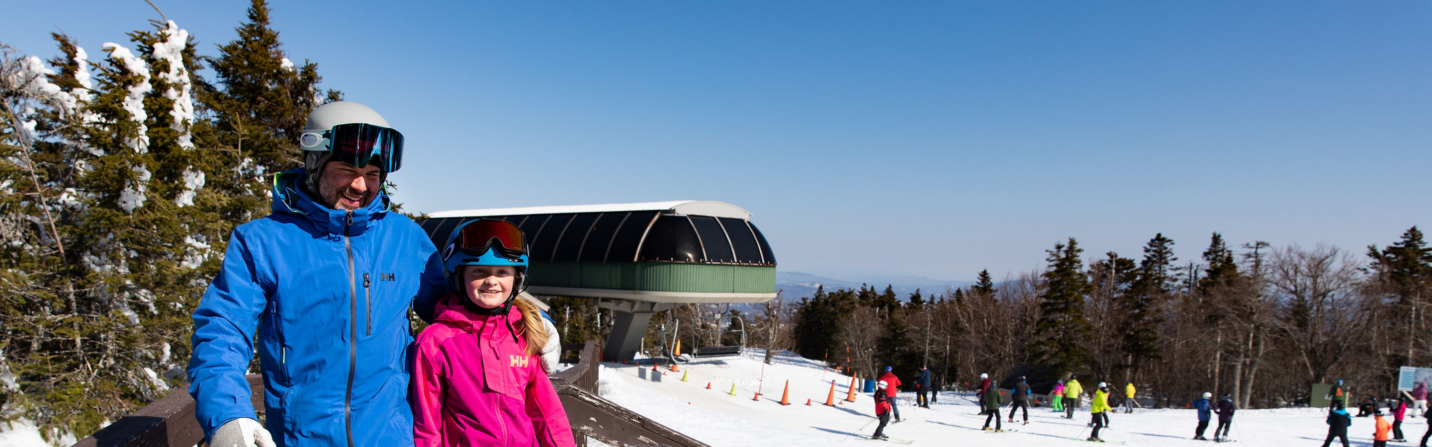 Father and Child Walking up Ramp at Summit  at Mount Sunapee