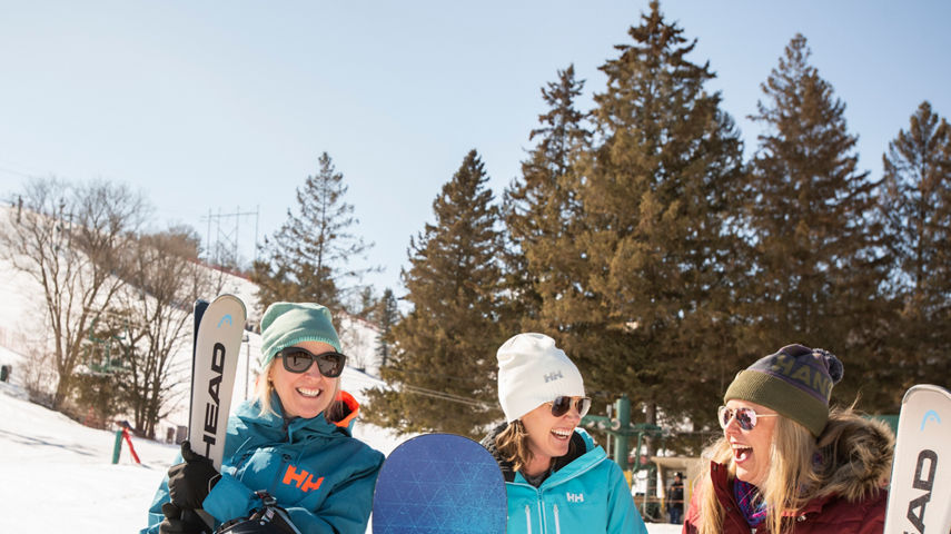 Women Laughing Before Hitting the Hill at Afton Alps