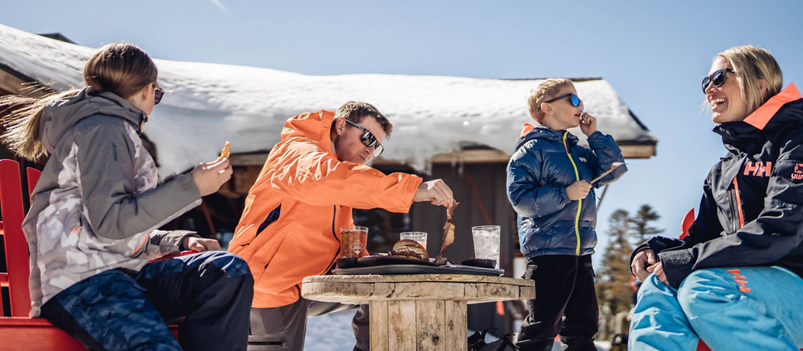 Family Enjoys Lunch Outside the Summit Smokehouse at Northstar California