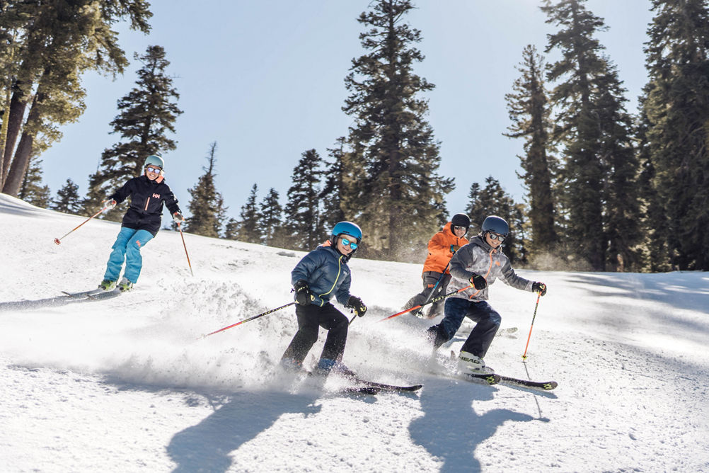Family Skis Together on a Spring Day at Northstar California