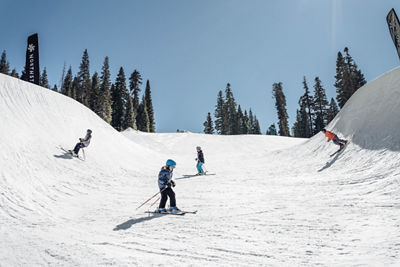 Family Goes Through a Terrain Park on a Spring Day at Northstar California