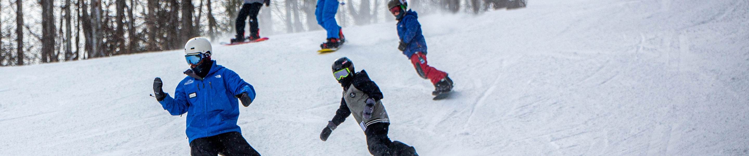 Kids Following Ride School Instructor Down the Hill at Hunter Mountain