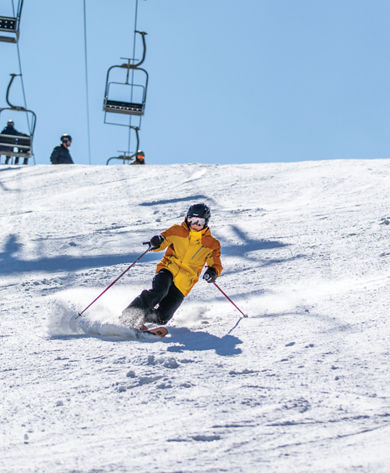 Telemark Skier Makes Downhill Turns at Jack Frost