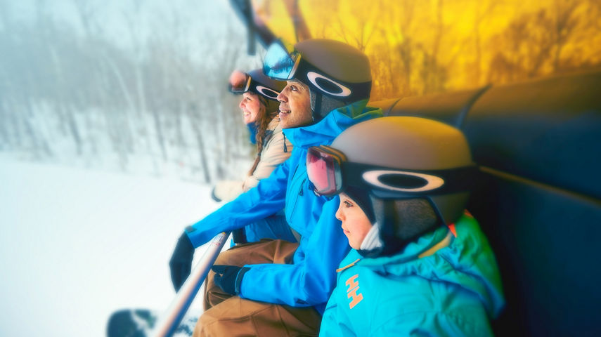Family Riding Sunburst Six Together at Okemo