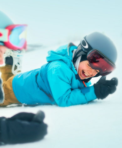 Brother and Sister Playing on Snow Laughing Together at Okemo