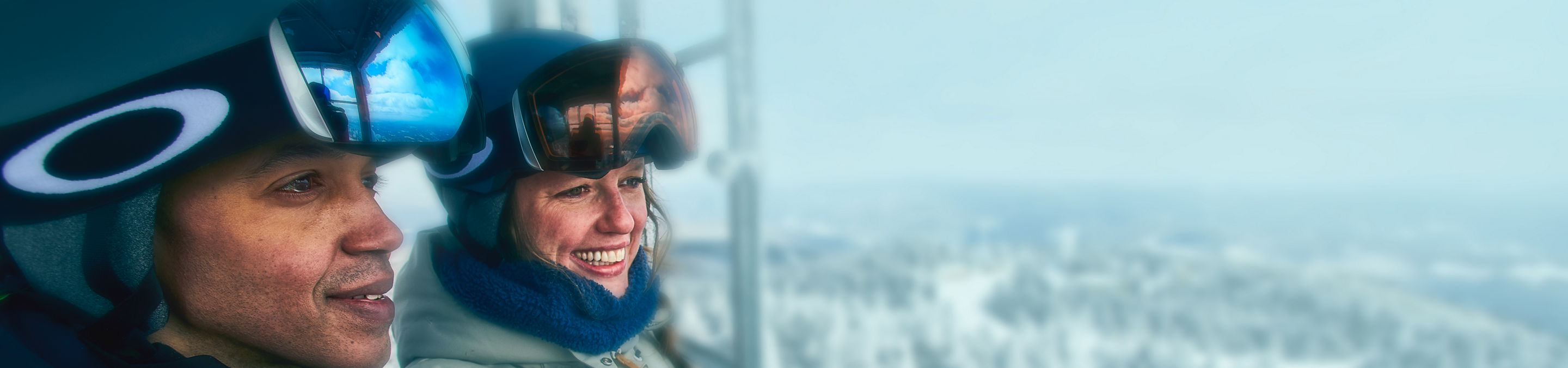 Two Adults Admiring View from Fire Tower at Summit at Okemo
