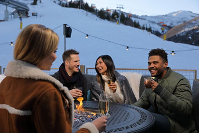 Friends enjoying cocktails at Red Tail Grill at Park City