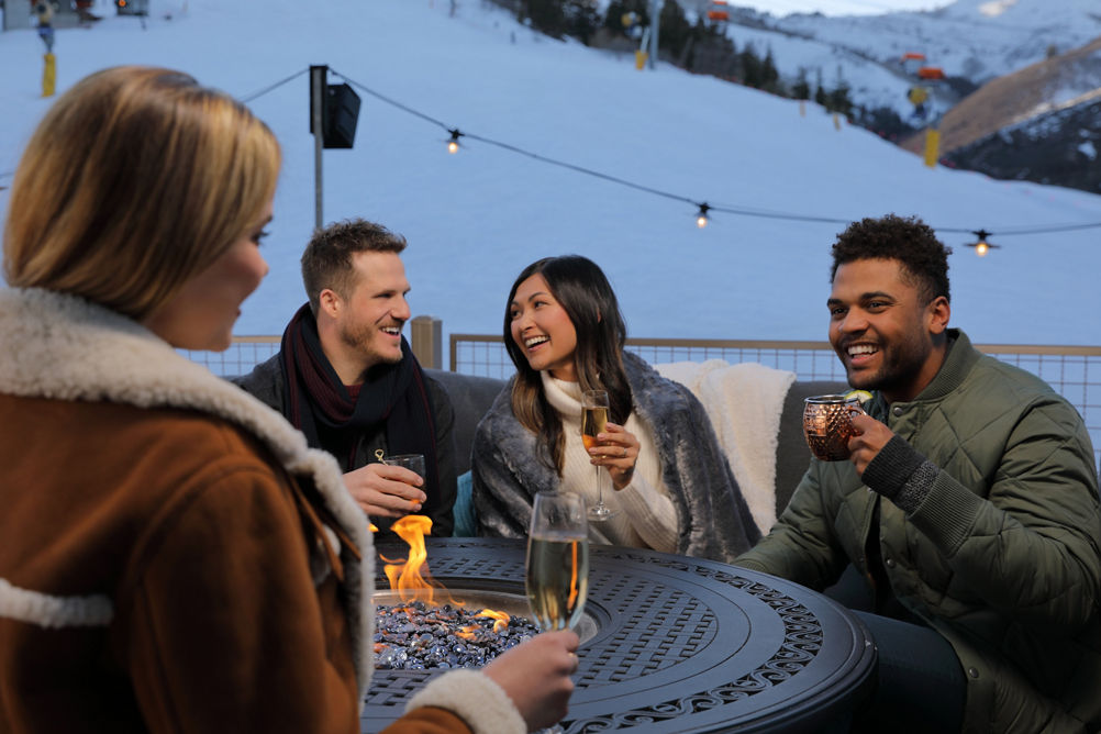 Friends enjoying cocktails at Red Tail Grill at Park City