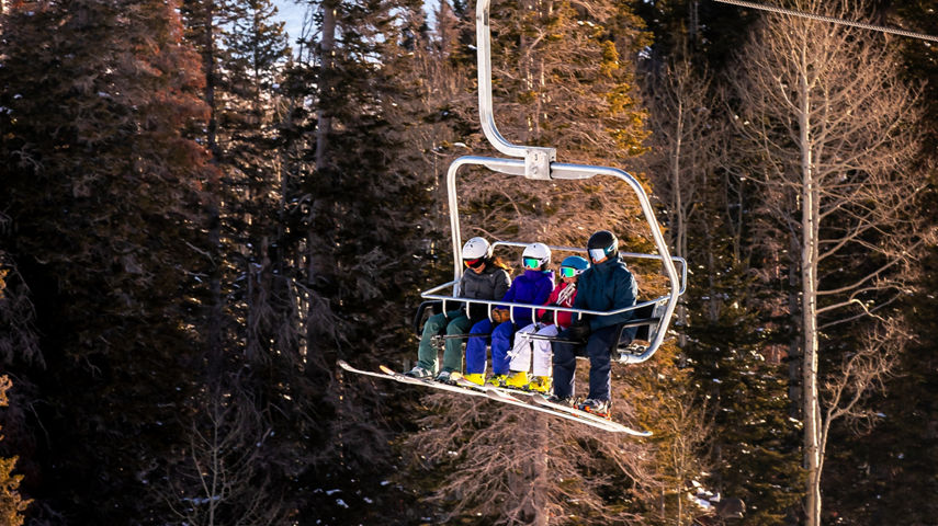 Family on Chairlift in High Meadow Park at Park City