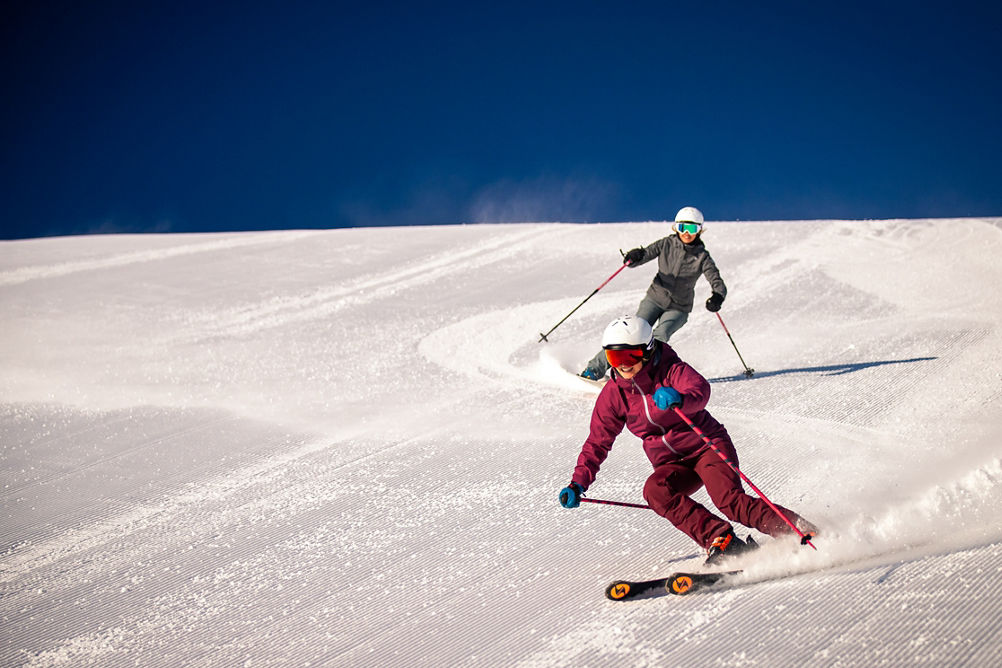 Friends Skiing on a groomer at Park City