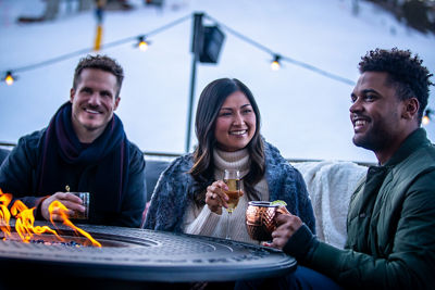 Friends enjoying apres at Red Tail Grill at Park City