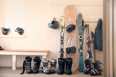 Ski and Snowboard Gear Lined Up Near Door at Okemo