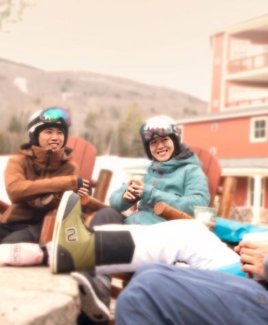 Group of Friends Relaxing in Base Area at Okemo
