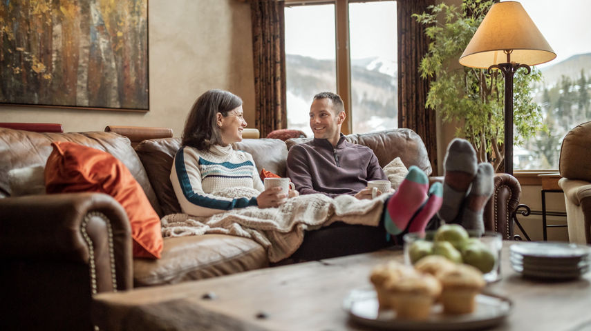 Couple Relaxes in their Condo in Beaver Creek, CO