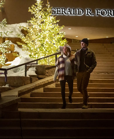 Couple Strolls through the village in Beaver Creek, CO