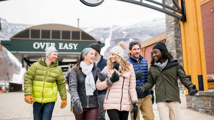 Friends enjoying Spruce Peak Village at Stowe Mountain Resort 