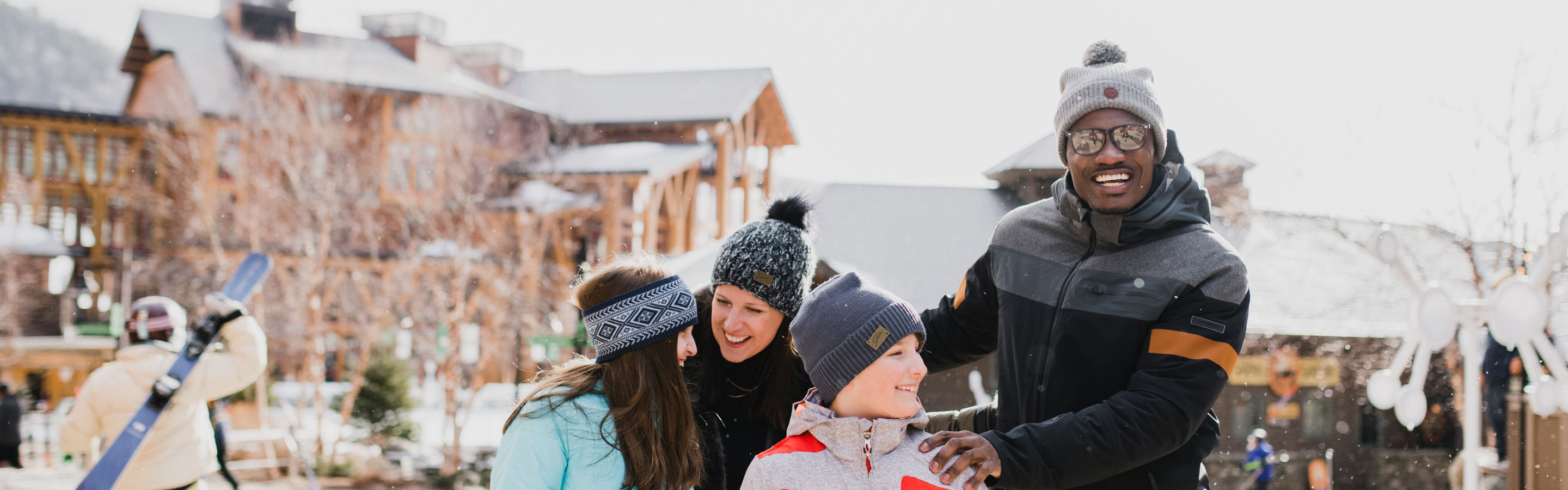 Family Walks Through Spruce Peak Village at Stowe Mountain Resort