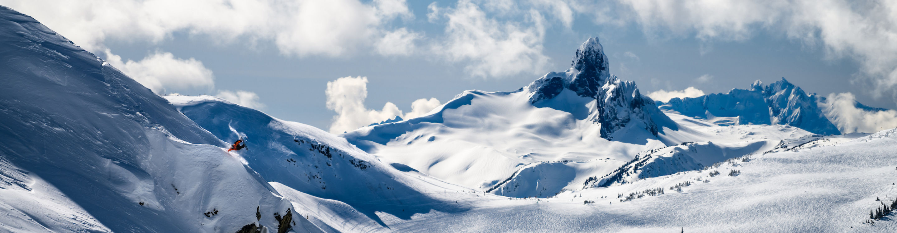 High alpine snowboarder with Black Tusk in background